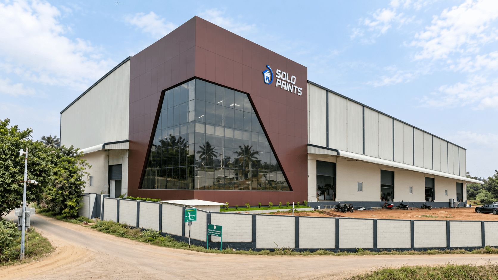 Solo Paints industrial warehouse with a brown glazed entrance block